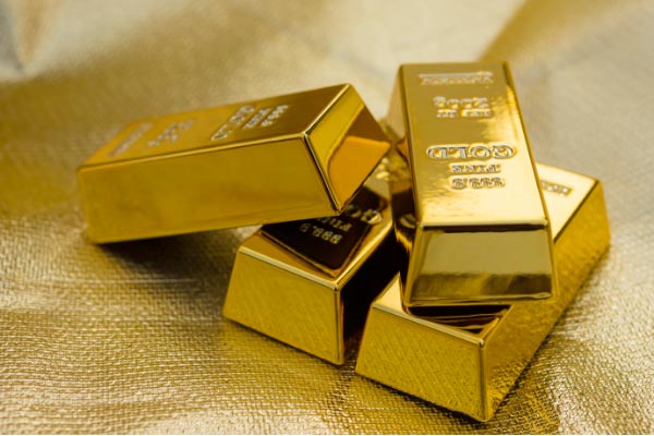 Quatre lingos d'or